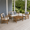 Porch setting | acacia conversation set with loveseat, two club chairs, and table on a blue-grey porch