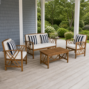 Porch setting | acacia conversation set with loveseat, two club chairs, and table on a blue-grey porch