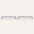 Front | two flat pale-gray mesh chaise lounges with dark gray iron rails on a studio sweep