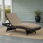 In a room | sea-glass porch with the dark woven chaise lounge, raised back and two Mocha cushions