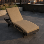 In a room | rooftop courtyard view of the dark woven chaise lounge with two Mocha cushions