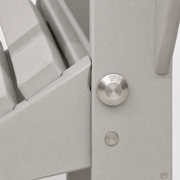 Folding hardware | tight macro of the brushed-metal pivot and light-gray folding bracket