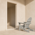 Scale | light-gray folding Adirondack chair beside a full-height open doorway