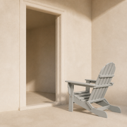 Scale | light-gray folding Adirondack chair beside a full-height open doorway