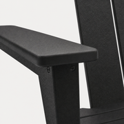 Texture | close view of the black HDPE armrest surface, pebbled texture, rounded edge, and adjacent back slat
