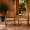 Room | two acacia rocking chairs in a warm terracotta courtyard with curved runners