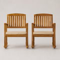 Studio | front view of two acacia rocking chairs with cream woven cushions and curved runners