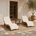 Scale | garden loggia scale view with two acacia chaise lounges, folding side table, and full-height doorway