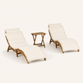 Studio | three-quarter studio view of acacia chaise lounge set with ivory cushions and folding side table