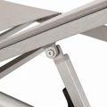 Recline hardware | hex fastener and stepped aluminum support brace beneath the light gray mesh rail