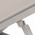 Mesh close-up | light gray fine-grid sling edge wrapped into a brushed silver aluminum rail