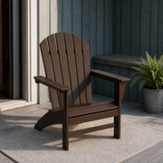 Room 2 | one mahogany fan-back Adirondack chair on a blue-gray cedar porch beside a doorway and fern