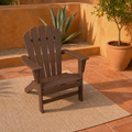 Room 3 | one mahogany fan-back Adirondack chair on terracotta tiles with ochre plaster, agave and a citrus tree