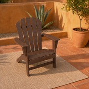 Room 3 | one mahogany fan-back Adirondack chair on terracotta tiles with ochre plaster, agave and a citrus tree
