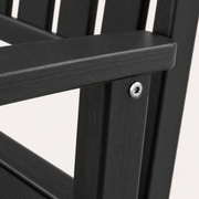 Hardware | Close-up of a silver Torx fastener joining black chair parts