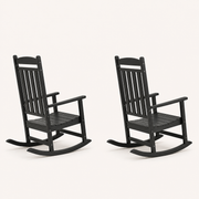 Studio side | Two black rocking chairs in side profiles showing runner depth