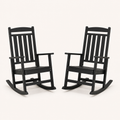 Studio angle | Two black rocking chairs from an angled view showing slatted seats and runners