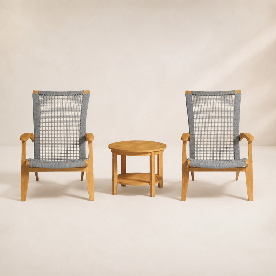 Front | two natural teak Adirondack chairs and one round slatted teak side table on warm white studio ground