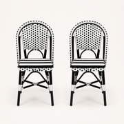 Front | front studio view of two black-and-white woven bistro dining chairs with striped seat cushions