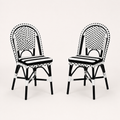Studio | three-quarter studio view of two black-and-white woven bistro dining chairs