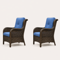 Side | true studio profile of two brown wicker patio chairs with tall backs and blue cushions