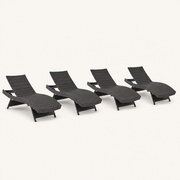 Studio | three-quarter studio view of four dark brown woven folding chaise lounges