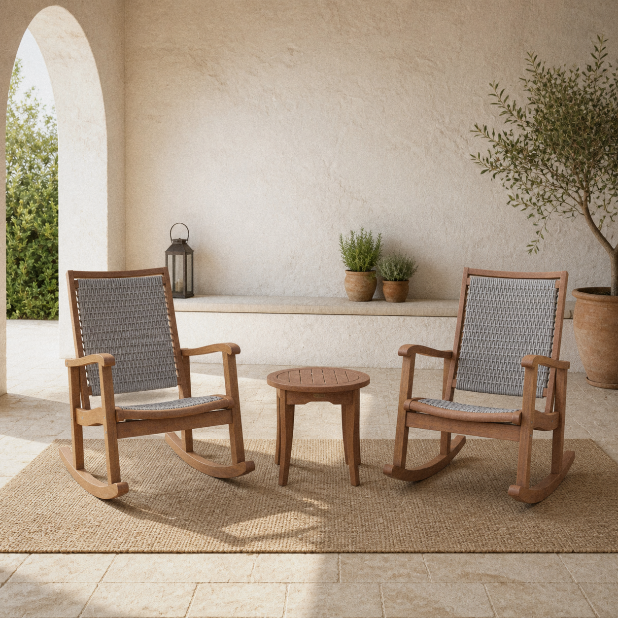 In a room | sunlit courtyard with two eucalyptus rocking chairs and a round slatted side table
