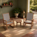 In a room | sage-green veranda with two rocking chairs and a round side table