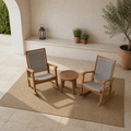 Second courtyard angle showing the complete two-chair and round side-table set