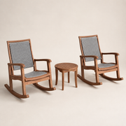 Studio | studio three-quarter view showing curved rocker runners, gray woven panels, and the round table