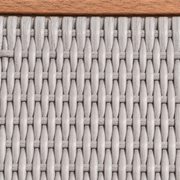 Texture | macro view of the gray woven resin-wicker strands on a rocking chair panel