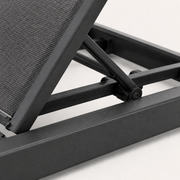 Hardware | close view of the dark charcoal reclining support strut and pivot