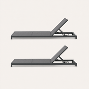 Side | side studio view of two gray mesh chaise lounges with raised backrests