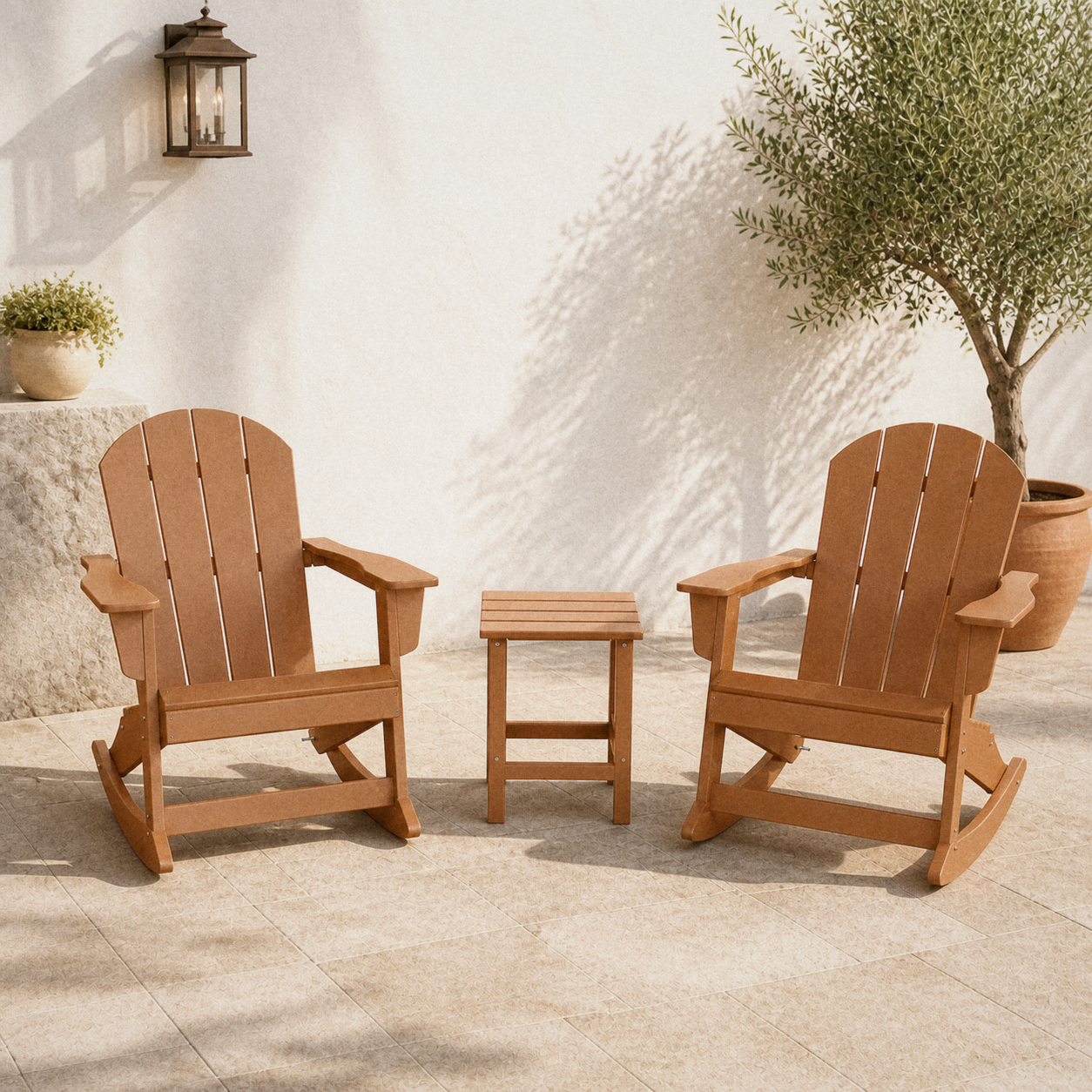 Room | two Teak-tone rocking Adirondack chairs and one slatted side table on a limestone terrace, olive tree and wall lantern