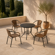 Terrace set | four Medium Brown woven-rattan armchairs separated around a round black table on pale stone