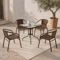 In a room | five-piece outdoor dining set on a sunlit limestone courtyard with an olive tree