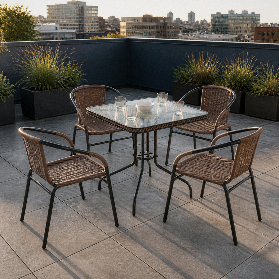 In a room | five-piece dining set on a charcoal city roof terrace with skyline beyond