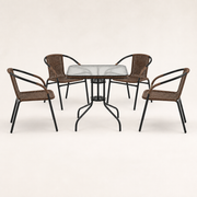Front | front studio view of one square rippled-glass table and four dark-brown woven armchairs