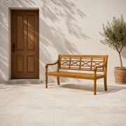 In scale | natural acacia garden bench beside a full-height wood exterior doorway