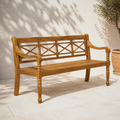 Courtyard angle | natural acacia garden bench on pale limestone by a limewashed wall and olive tree