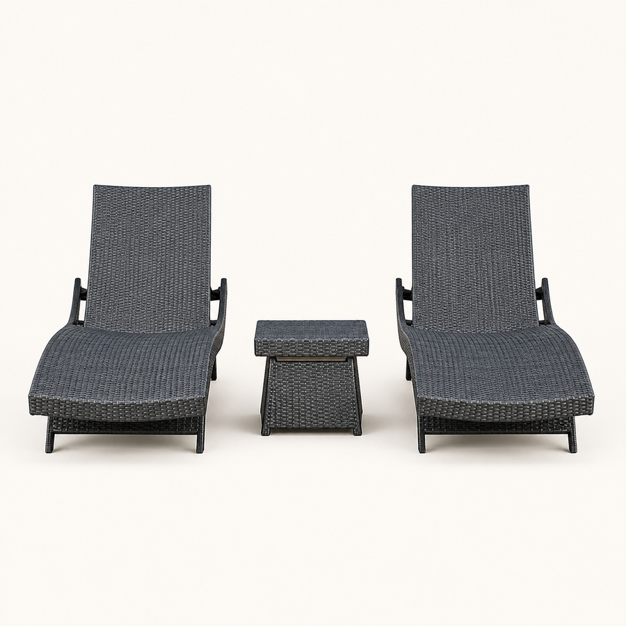 Front | front studio view of two charcoal-gray woven chaise loungers with a matching side table