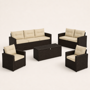 Studio angle | sofa, loveseat, two armchairs, and storage table on a warm paper background
