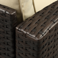 Wicker detail | close view of dark brown woven resin wicker and beige cushion edge