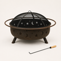 Studio | three-quarter studio view of the bronze fire pit with mesh screen, tubular ring and poker