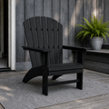 Cedar porch | black Adirondack chair in front of blue-gray vertical boards