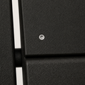 Material detail | matte black HDPE plank surface with a visible screw