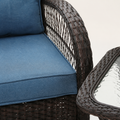 Material detail | Navy Blue cushion texture, dark-brown PE-rattan weave, and tempered glass table edge