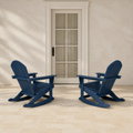 Scale | two navy blue rocking Adirondack chairs beside a full-height glass exterior door