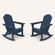 Studio angle | two navy blue rocking Adirondack chairs shown three-quarter from the front with curved runners visible