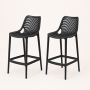 Angle | two black lattice bar stools at a three-quarter studio angle, open seats and footrest rails visible
